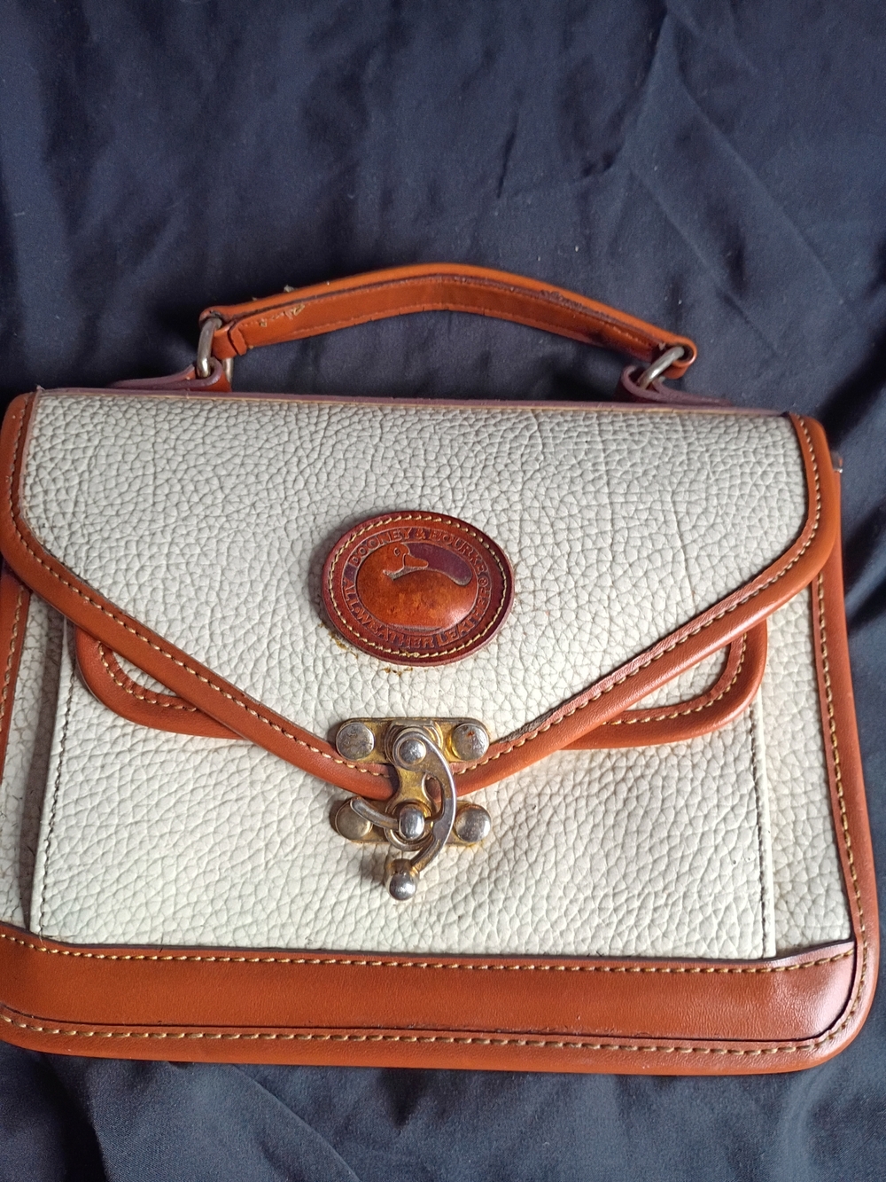 Dooney & Bourke Cream Pebbled Leather Satchel with Tan Trim